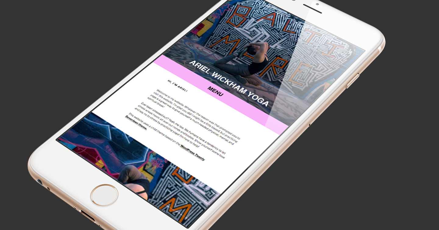 Ariel Wickham Yoga website on a phone