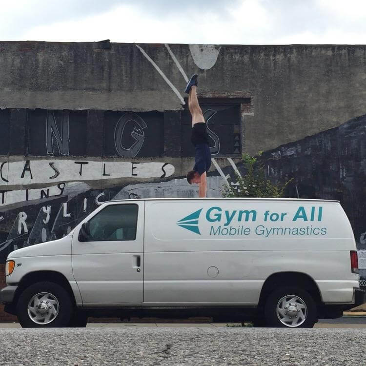 Gym for All logo on the side of the company van