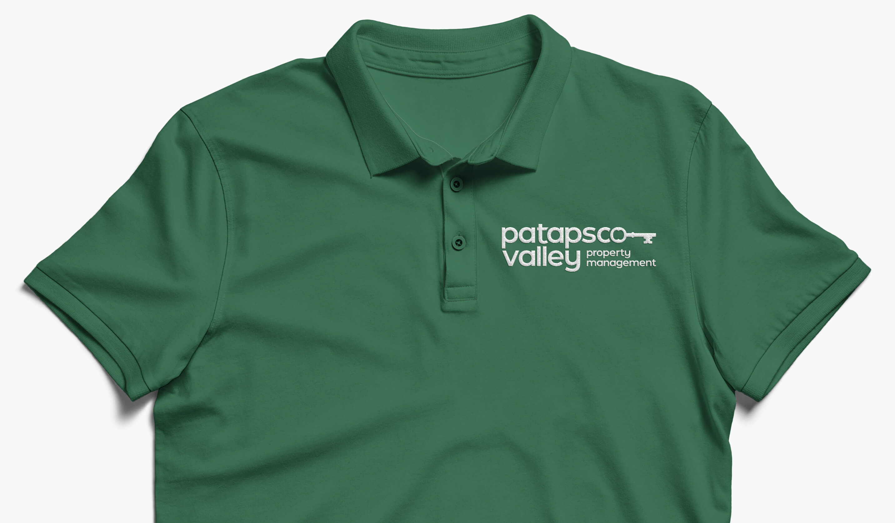 Patapsco Valley Property Management logo embroidered on a polo shirt